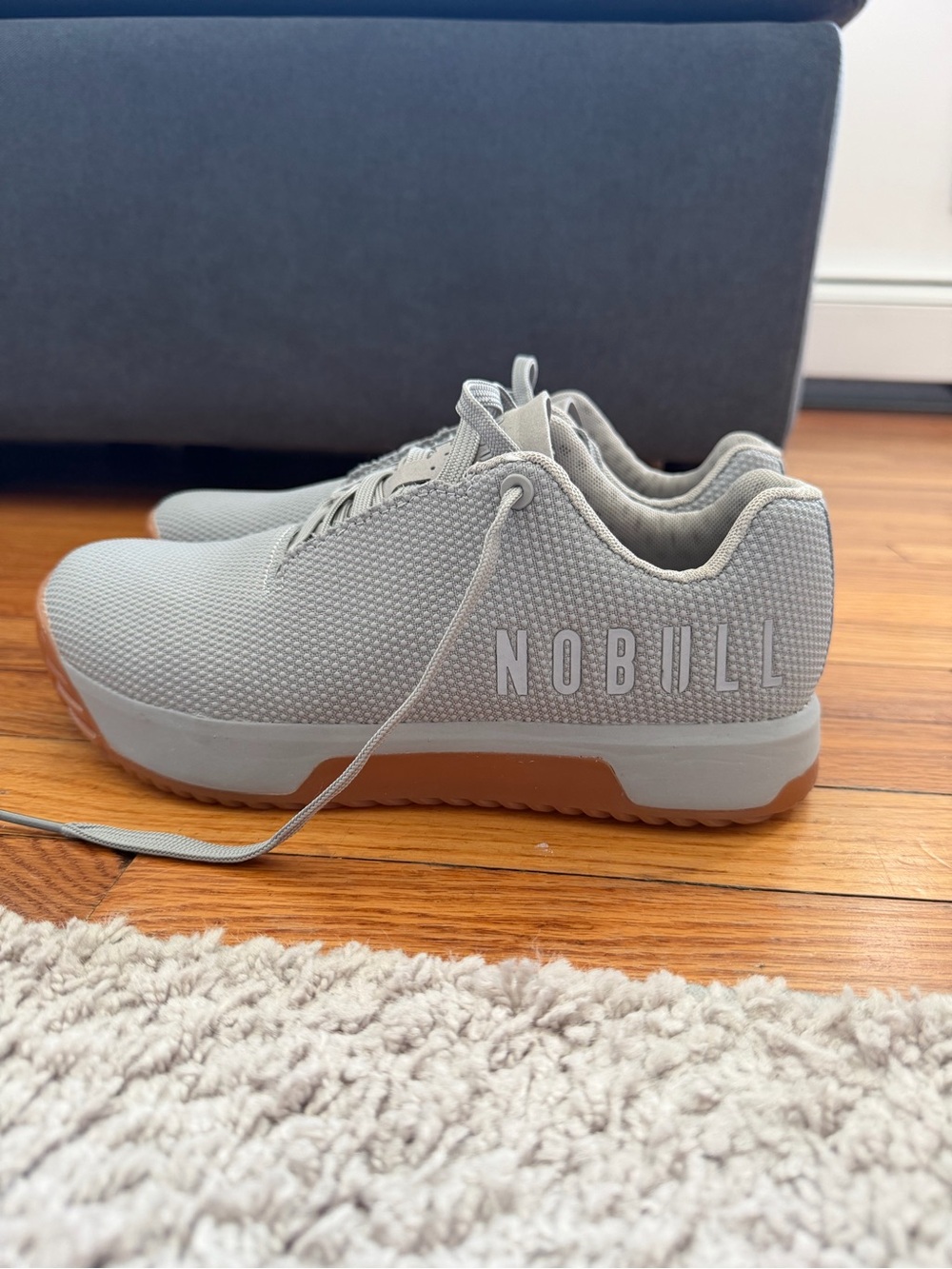 NOBULL Woman’s Trainer in Light Gray with Gum Outsole